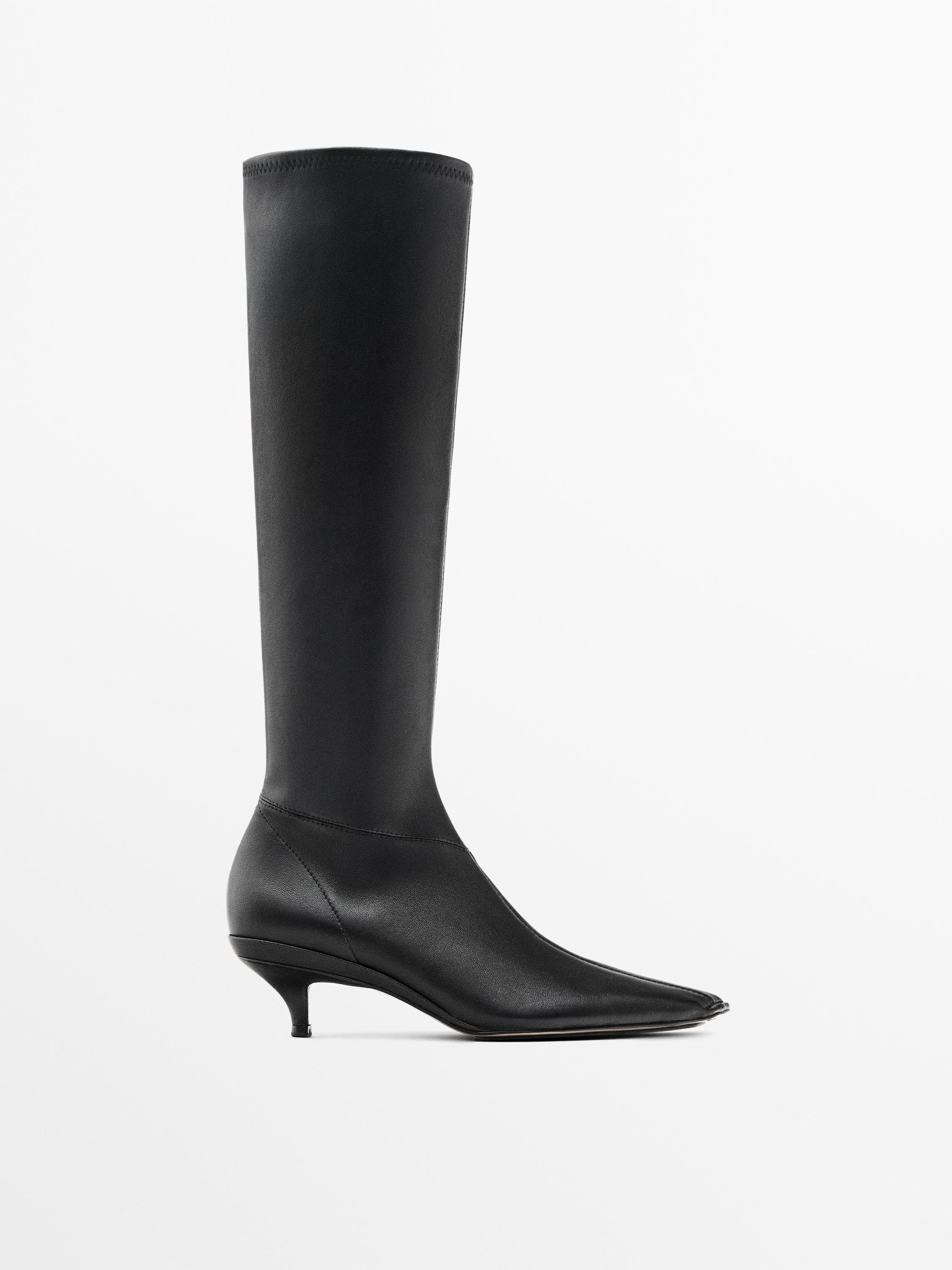 Stretch heeled boots